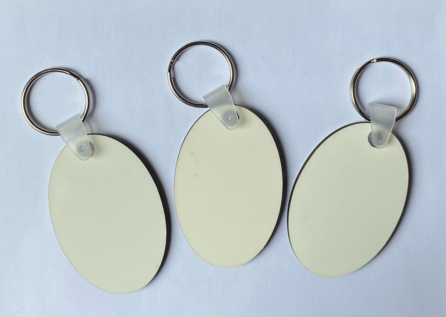 50 x Blank Sublimation MDF Keyrings 6cm x 4cm Double Sided Oval