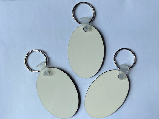 12 x Blank Sublimation MDF Keyrings 6cm x 4cm Double Sided Oval - sublimania.com - Muglamania Limited