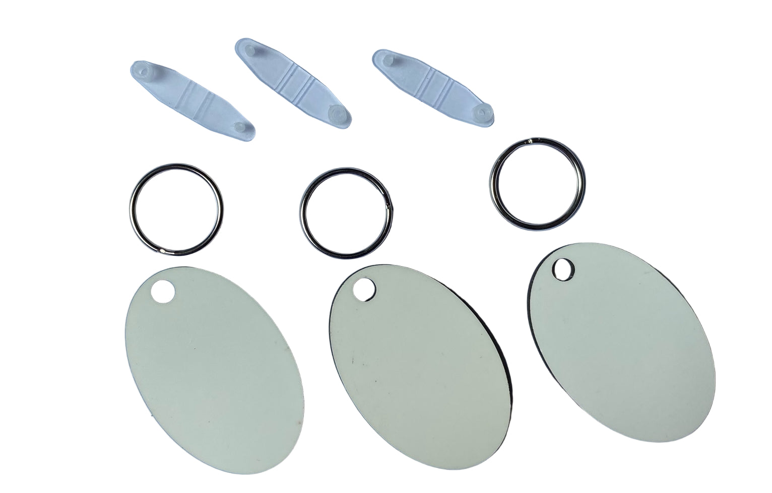 Blank oval MDF keyring for sublimation printing, double sided, 6cm x 4cm, perfect for personalised gifts and crafts.