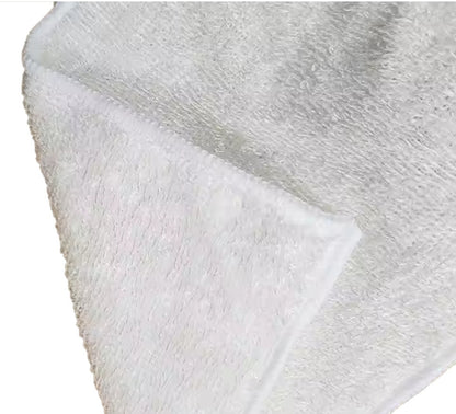 A close-up of a white plush terry cloth fabric, showing its soft, textured surface sublimation microfibre tea towel